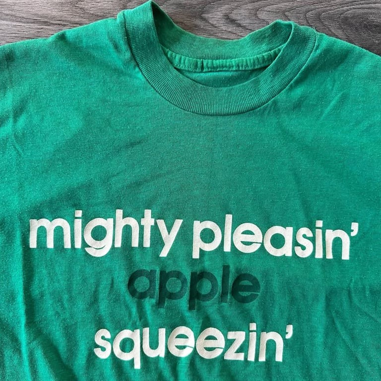 Vintage 80s Mighty Pleasin’ Apple Squeezin’ T-Shirt